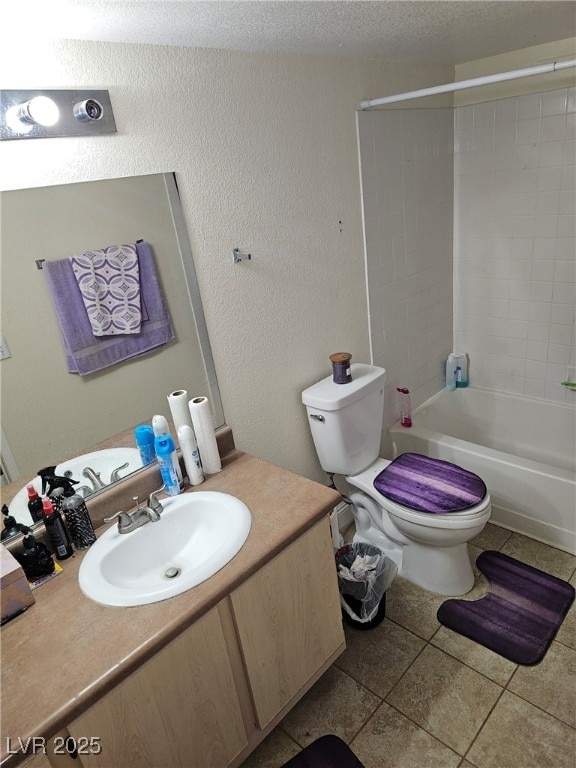 555 E Silverado Ranch Blvd Unit 2028, Las Vegas, NV 89183 - full bathroom with toilet, tile patterned flooring, vanity, a textured wall, and shower / bathtub combination