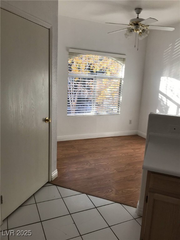 9000 Las Vegas Blvd Unit 2033, Las Vegas, NV 89123 - unfurnished dining area with a ceiling fan, baseboards, and light wood-type flooring