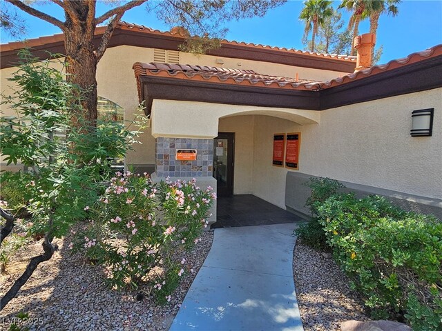 9000 Las Vegas Blvd Unit 2033, Las Vegas, NV 89123 - doorway to property with stucco siding and a tile roof