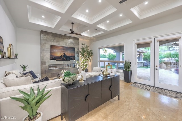 living area with ceiling fan, french doors, crown molding, beamed ceiling, and coffered ceiling