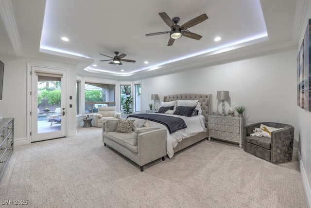 bedroom with access to outside, baseboards, recessed lighting, and a raised ceiling