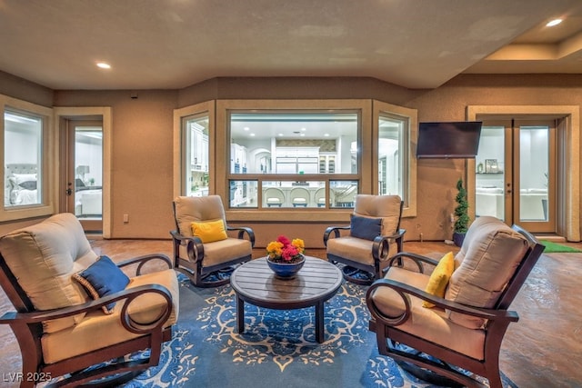 sitting room featuring recessed lighting