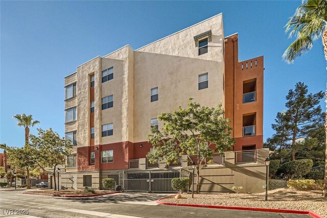55 E Agate Ave Unit 202, Las Vegas, NV 89123 - view of property featuring fence