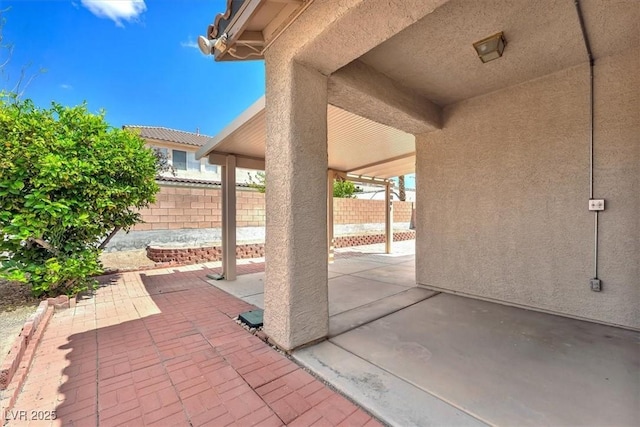 view of patio / terrace with fence