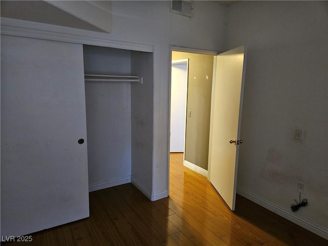 2615 W Gary Ave Unit 1085, Las Vegas, NV 89123 - unfurnished bedroom with wood finished floors and a closet