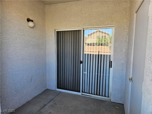 2615 W Gary Ave Unit 1085, Las Vegas, NV 89123 - doorway to property featuring stucco siding