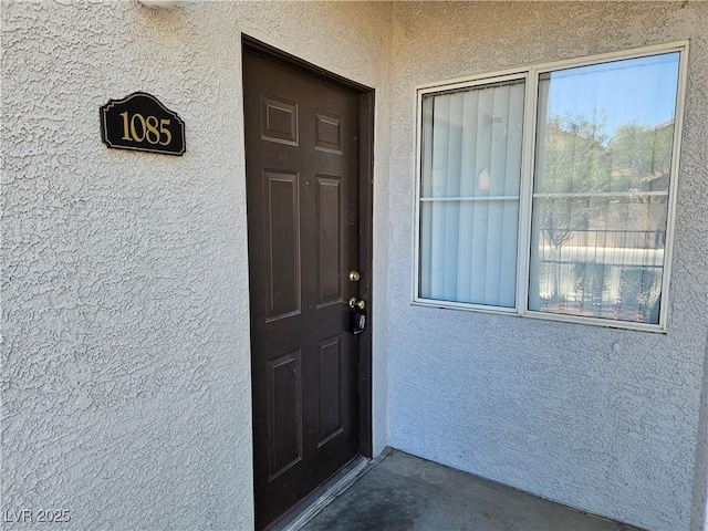 2615 W Gary Ave Unit 1085, Las Vegas, NV 89123 - view of exterior entry featuring stucco siding