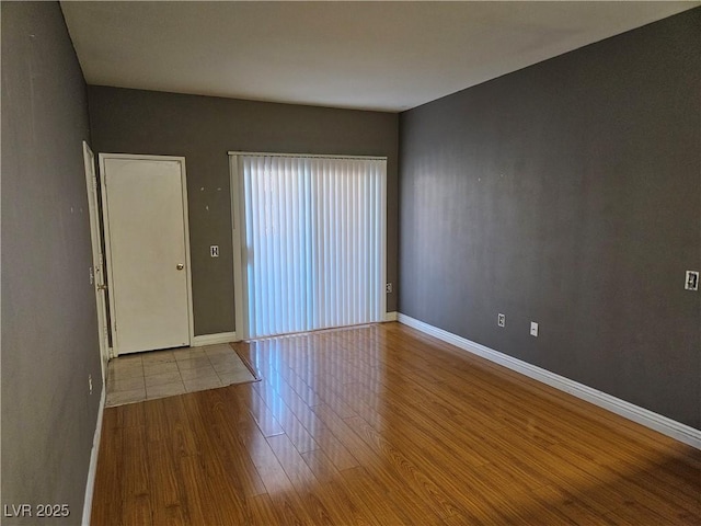 2615 W Gary Ave Unit 1085, Las Vegas, NV 89123 - unfurnished room featuring wood finished floors and baseboards