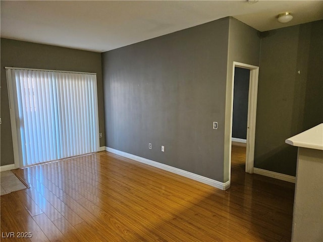 2615 W Gary Ave Unit 1085, Las Vegas, NV 89123 - empty room with wood finished floors