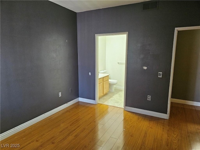 2615 W Gary Ave Unit 1085, Las Vegas, NV 89123 - empty room featuring light wood-style flooring and baseboards