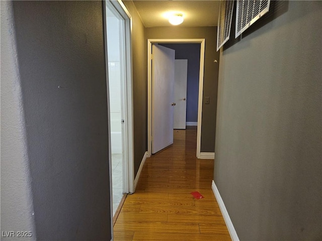 2615 W Gary Ave Unit 1085, Las Vegas, NV 89123 - corridor with light wood-style floors and baseboards