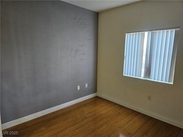 2615 W Gary Ave Unit 1085, Las Vegas, NV 89123 - empty room with wood finished floors and baseboards