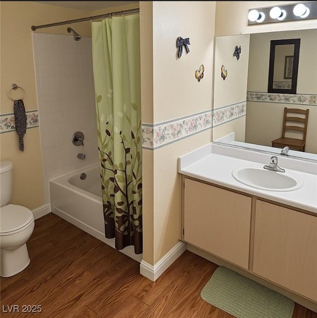8101 W Flamingo Rd Unit 2078, Las Vegas, NV 89147 - bathroom with toilet, wood finished floors, shower / bath combo, vanity, and baseboards