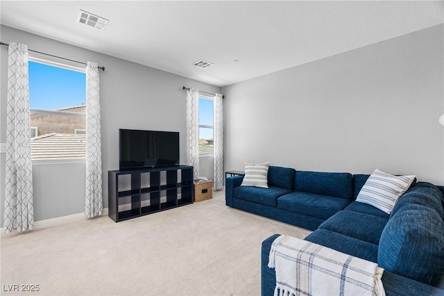 living area with carpet and baseboards
