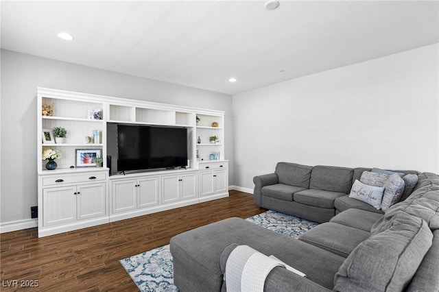 living area with dark wood-style floors, baseboards, and recessed lighting