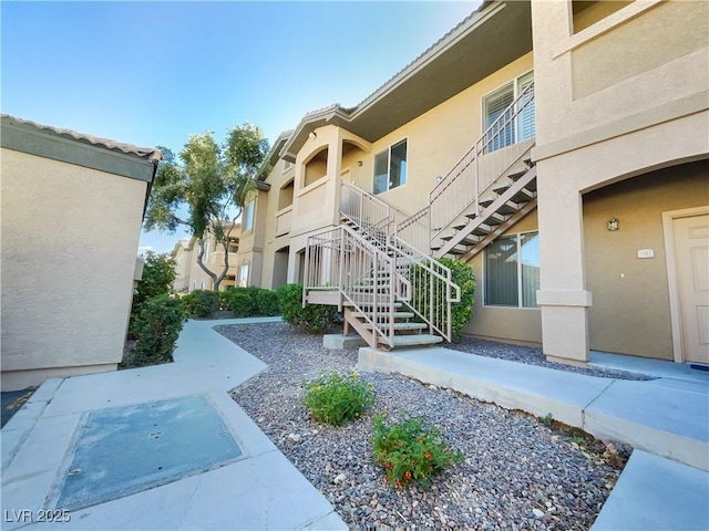surrounding community featuring stairway