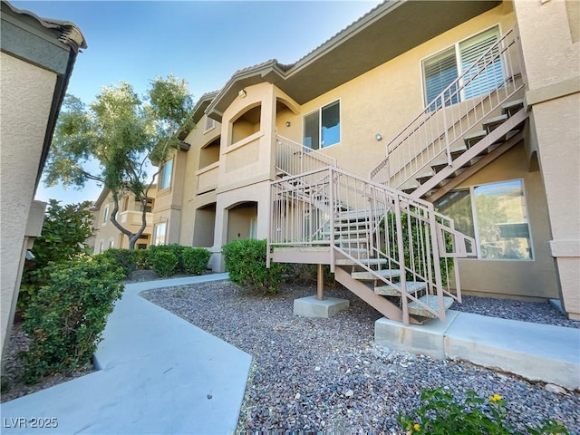 view of property with stairs