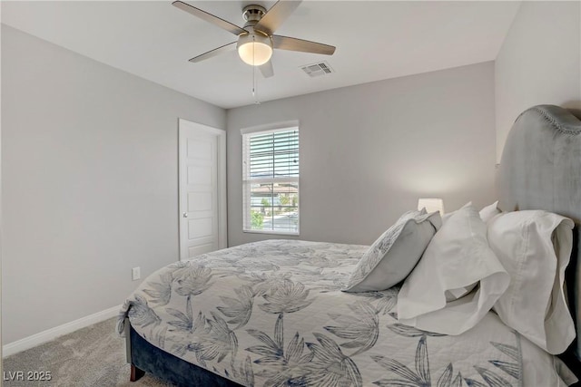 bedroom with baseboards, ceiling fan, carpet flooring, and visible vents