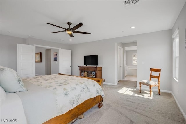 bedroom featuring visible vents, baseboards, light carpet, and multiple windows