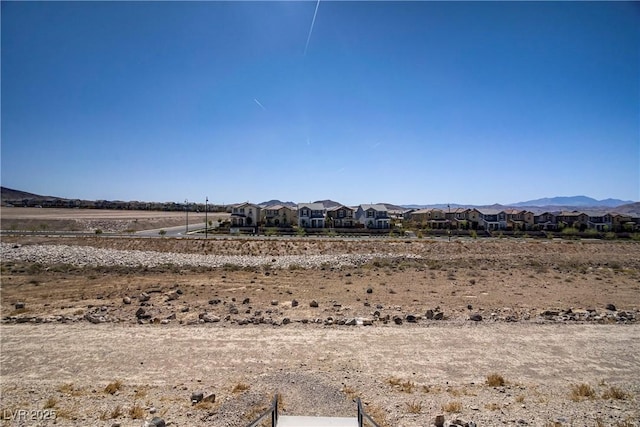 view of yard featuring a residential view