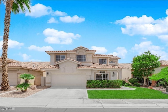 mediterranean / spanish house with stucco siding, concrete driveway, a tile roof, and a front yard