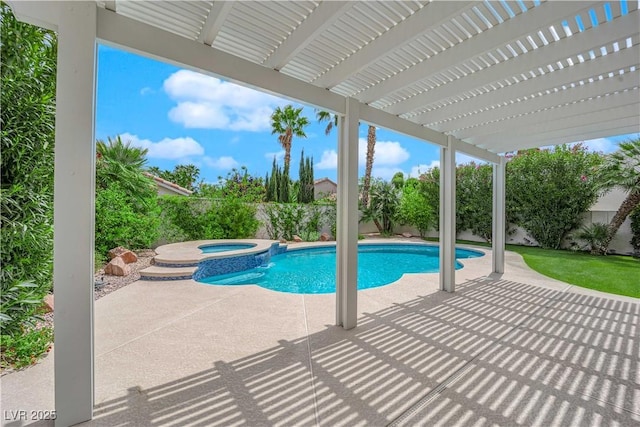 view of swimming pool with a fenced backyard, a patio area, and a pool with connected hot tub