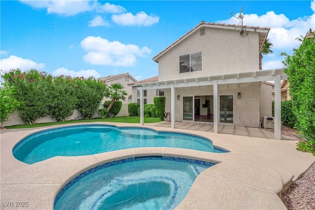 view of swimming pool featuring a pergola, an in ground hot tub, a fenced in pool, and a patio