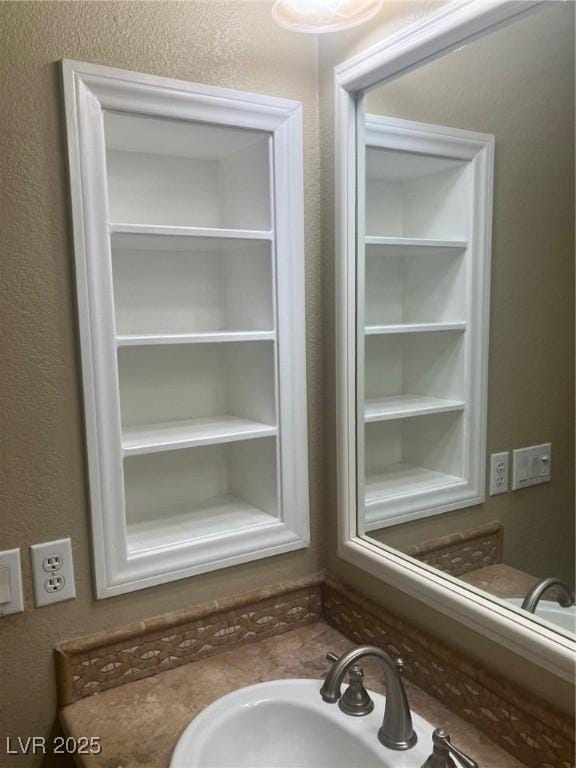 32 Via Vasari Unit 103, Henderson, NV 89011 - bathroom with a sink and a textured wall