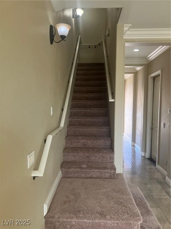32 Via Vasari Unit 103, Henderson, NV 89011 - stairs with baseboards and ornamental molding