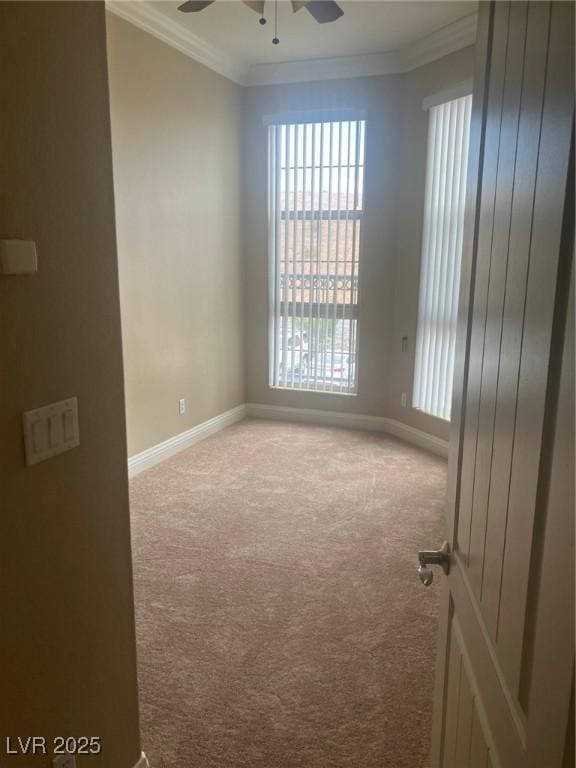 32 Via Vasari Unit 103, Henderson, NV 89011 - carpeted empty room featuring baseboards, crown molding, ceiling fan, and plenty of natural light