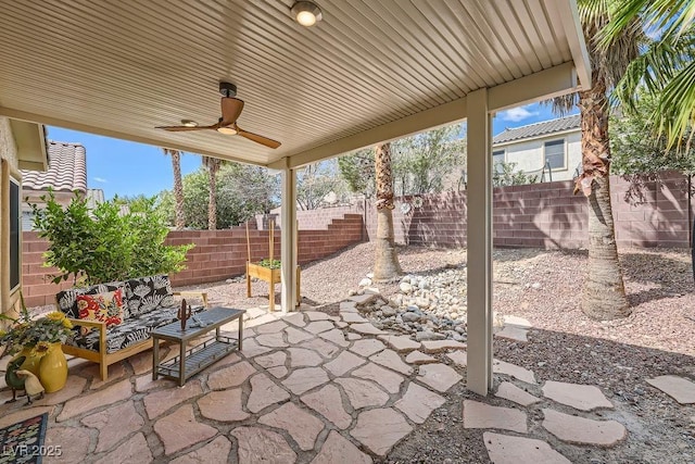 view of patio with a ceiling fan, a fenced backyard, and an outdoor hangout area