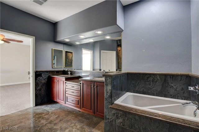 full bath featuring double vanity, a sink, a garden tub, and visible vents