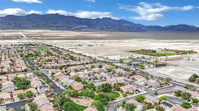 aerial view featuring a mountain view and a residential view