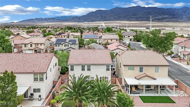 aerial view featuring a residential view and a mountain view