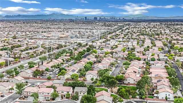 drone / aerial view with a mountain view and a residential view