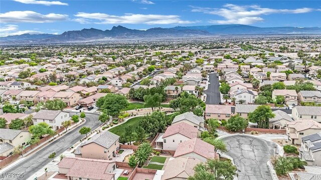 birds eye view of property featuring a residential view and a mountain view