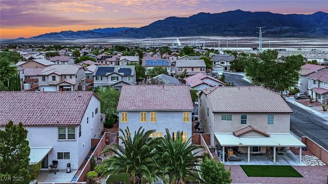 bird's eye view with a residential view and a mountain view