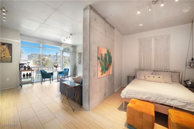 353 E Bonneville Ave Unit 215, Las Vegas, NV 89101 - bedroom featuring track lighting