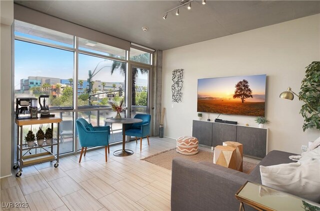 353 E Bonneville Ave Unit 215, Las Vegas, NV 89101 - living area featuring floor to ceiling windows