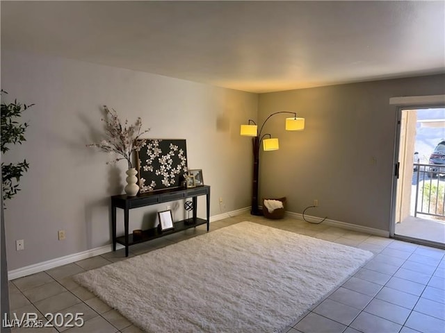 4965 Indian River Dr Unit 101, Las Vegas, NV 89103 - tiled living area with baseboards