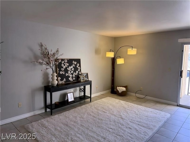 4965 Indian River Dr Unit 101, Las Vegas, NV 89103 - tiled living room with baseboards