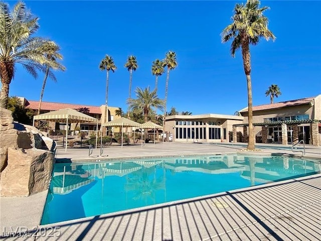 4965 Indian River Dr Unit 101, Las Vegas, NV 89103 - community pool featuring a patio and a gazebo