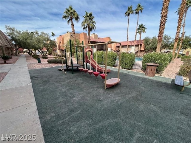 4965 Indian River Dr Unit 101, Las Vegas, NV 89103 - community play area featuring a residential view