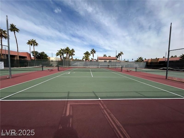 4965 Indian River Dr Unit 101, Las Vegas, NV 89103 - view of tennis court with fence and community basketball court