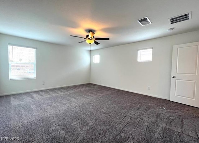2970 Saltillo Ln, Las Vegas, NV 89121 - empty room featuring ceiling fan, visible vents, baseboards, and dark colored carpet