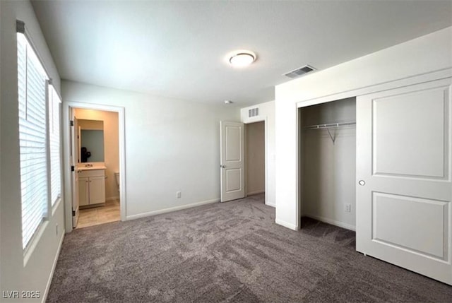 2970 Saltillo Ln, Las Vegas, NV 89121 - unfurnished bedroom featuring carpet floors, visible vents, and multiple windows