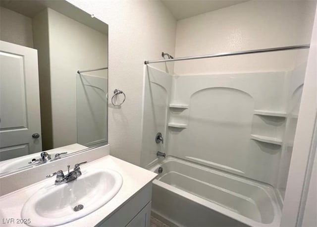 2970 Saltillo Ln, Las Vegas, NV 89121 - full bathroom with vanity, a textured wall, and  shower combination