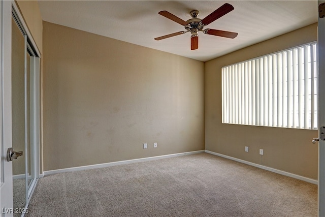 1608 Sussex St Unit 204, Las Vegas, NV 89144 - carpeted empty room featuring baseboards, plenty of natural light, and ceiling fan