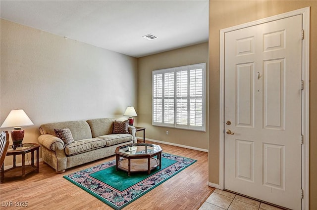 1574 Livingston Dr, Henderson, NV 89012 - living area featuring light wood-style floors and baseboards