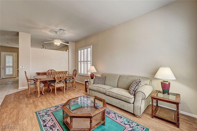 1574 Livingston Dr, Henderson, NV 89012 - living room featuring a ceiling fan and wood finished floors
